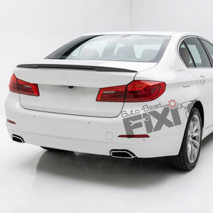 White BMW sedan shown from the rear three-quarter angle in a studio setting, with a black trunk spoiler and a large 'Auto Best FIX IT' watermark overlay on the right side.